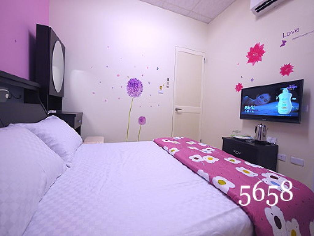 Hua Qiao De Jia Apartment Дунган Екстериор снимка